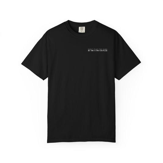 A short sleeve black t-shirt with white letters that say don't play the game be the game-changer across the left chest