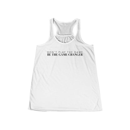 A racerback women's white tank with don't play the game be the game-changer written in black text across the chest 