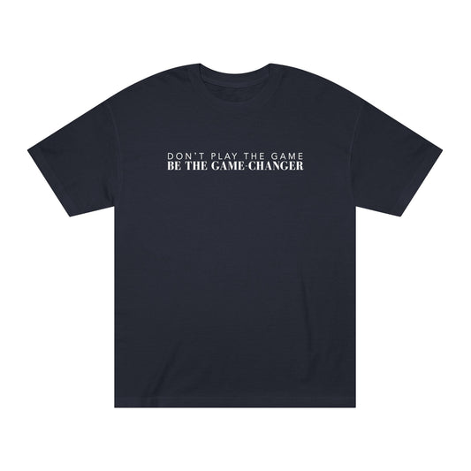 A short sleeve black t-shirt with white letters that say don't play the game be the game-changer across the chest