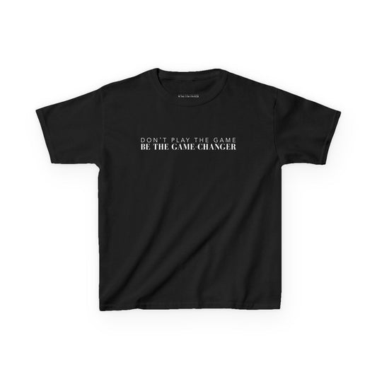 A kid's short sleeve black t-shirt with white letters that say don't play the game be the game-changer across the chest
