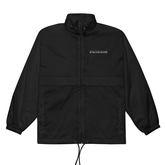 Forward facing view of Black windbreaker with Don't Play the Game Be the Game Changer in white text over the left chest